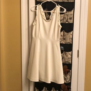 Cream colored cocktail dress with pearl detail